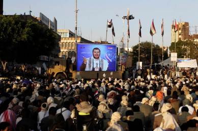 Shi'ite Houthi rebels watch a televised speech by their leader Abdul Malik al-Houthi